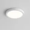 A white, round LED ceiling light is mounted on a light gray ceiling. Náhľad obrázku produktu