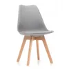 A gray tulip-style dining chair with wooden legs, shown on a white background. Náhľad obrázku produktu