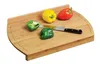 A bamboo cutting board with bell peppers and a knife. Anteprima dell’immagine prodotto