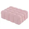 A pink upholstered ottoman or footstool. Anteprima dell’immagine prodotto