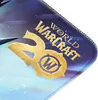 A close-up view of a World of WarCraft 20th Anniversary mousepad, showing the logo and part of the artwork. Produktbild-Vorschau