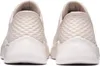 The back view of two beige Skechers women's sneakers. Náhľad obrázku produktu