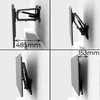 Four views of a TV wall mount, showing its extension and depth. Produktbild-Vorschau