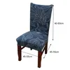 A chair with a blue leaf-patterned cover, with dimensions indicated. Náhled obrázku produktu