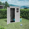 A grey resin shed with its doors open, set in a grassy garden with a hedge and distant mountains in the background. A blue hose reel and some items are visible inside the shed. A blue and white ball lies on the grass in the foreground. Produktbild-Vorschau