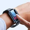 A person's wrist wearing a smartwatch, with a finger interacting with the screen. Náhled obrázku produktu