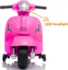 Front view of a pink children's electric scooter with an orange arrow pointing to the LED headlight and text labeling it. Anteprima dell’immagine prodotto