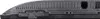 A close-up view of the side and bottom of a black electronic device, likely a TV or monitor, showing ventilation grilles and connection ports. Produktbild-Vorschau