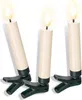 Three cream-colored LED candles with black bases and clips are arranged diagonally against a white background. Produktbild-Vorschau