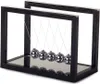A Newton's cradle toy with silver balls and a black frame, set against a white background. Náhľad obrázku produktu
