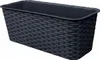A dark gray rectangular planter with a rattan-like texture, shown from a slightly elevated side angle against a white background. Voir les images du produit