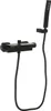 A black shower fixture with a handheld showerhead and a shelf, isolated on a white background. Náhled obrázku produktu