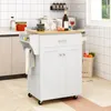 A white kitchen cart with a wooden top is shown in a kitchen setting. Podgląd zdjęcia produktu