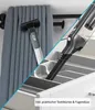 Collage showing a handheld vacuum cleaner with different attachments, one used on a curtain and another in a drawer organizer. Produktbild-Vorschau