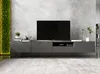 A modern living room with a wall-mounted TV stand and a large television. Produktbild-Vorschau