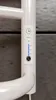 A close-up of a white electric towel rail's control panel, showing a timer and temperature settings. Náhľad obrázku produktu