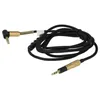 A black audio AUX cable with gold connectors is laid out on a white background. Produktbild-Vorschau