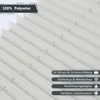 A close-up, angled view of a white pleated blind, with text overlays highlighting product features. Produktbild-Vorschau