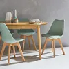 A dining table with four chairs. Produktbild-Vorschau
