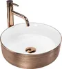 A rose gold and white basin with a rose gold faucet, presented against a white background. Produktbild-Vorschau