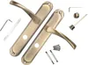 A set of door handles and installation hardware, laid out on a white background. Produktbild-Vorschau