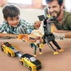 A father and son are playing with transforming robot toys on a wooden table. Náhled obrázku produktu