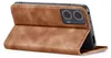 A brown leather flip case for a smartphone is shown from the side, with the phone partially inserted and its camera array visible. Produktbild-Vorschau