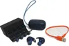 A collection of JBL Reflect Aero earbuds, charging case, and accessories laid out on a white background. Náhľad obrázku produktu
