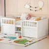 A child's bedroom with a white wooden bed, colorful rug, and wall decorations. Anteprima dell’immagine prodotto