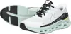 A pair of white Skechers Glide-Step Altus Slip-On shoes are shown from a diagonal angle. Voir les images du produit