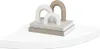 A white corner shelf with a decorative item on it. Voir les images du produit