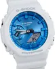A close-up, front-facing studio shot of a white and blue G-Shock watch. Voir les images du produit
