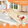 Two children playing on a wooden climbing structure indoors. Produktbild-Vorschau