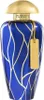 A perfume bottle with a blue and gold design. Anteprima dell’immagine prodotto