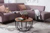 A living room scene with a sectional sofa and a coffee table. Voir les images du produit