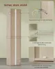 A furniture product, likely a cabinet or shelf unit, with close-up diagrams illustrating its stability and safety features. Produktbild-Vorschau