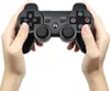 Two hands holding a black PS3 controller. Podgląd zdjęcia produktu