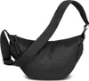 A black Bench shoulder bag is shown against a white background. Produktbild-Vorschau