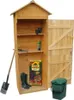 A wooden garden shed with its door open, displaying various gardening tools and supplies inside. Produktbild-Vorschau