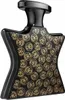 A black perfume bottle with gold circular patterns. Náhled obrázku produktu