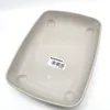 A light gray cat litter box viewed from a high angle against a white background. Produktbild-Vorschau