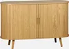A light wood sideboard with two doors and four legs against a white background. Anteprima dell’immagine prodotto