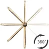 A gold-colored faucet with multiple arms radiating from a central point, suggesting 360-degree rotation, on a white background. Anteprima dell’immagine prodotto