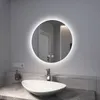 A modern bathroom sink area with a lit mirror. Produktbild-Vorschau