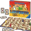 A board game, Das verrückte Labyrinth, is displayed with its box and game board. The game board is set up with pieces and cards scattered around. Produktbild-Vorschau