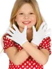 A young girl wearing a red and white polka dot dress and white gloves, posing with her hands crossed in front of her. Anteprima dell’immagine prodotto