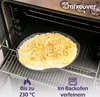 A dish of food, likely a gratin or casserole, is placed on a rack inside an open oven. The food is topped with shredded cheese and appears to be ready for baking. Produktbild-Vorschau