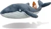 A plush toy of a whale with a snail on its back, isolated on a white background. Produktbild-Vorschau