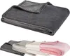 A folded blanket is shown in the foreground, with a row of folded blankets in different colors in the background. Produktbild-Vorschau