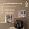 A collage of three modern tea-making machines in different colors. Produktbild-Vorschau